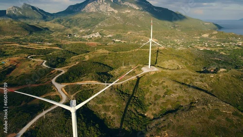 Wind turbine non rotation in wind power farm on windless overcast day, aerial shot
