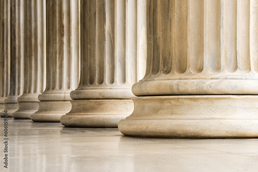 Architectural detail of marble ionic order columns Architectural detail of marble ionic order columns