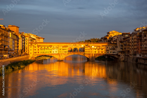 River Arno and famous bridge Ponte Vecchio at sunset from Ponte alle Grazie in Florence Italy