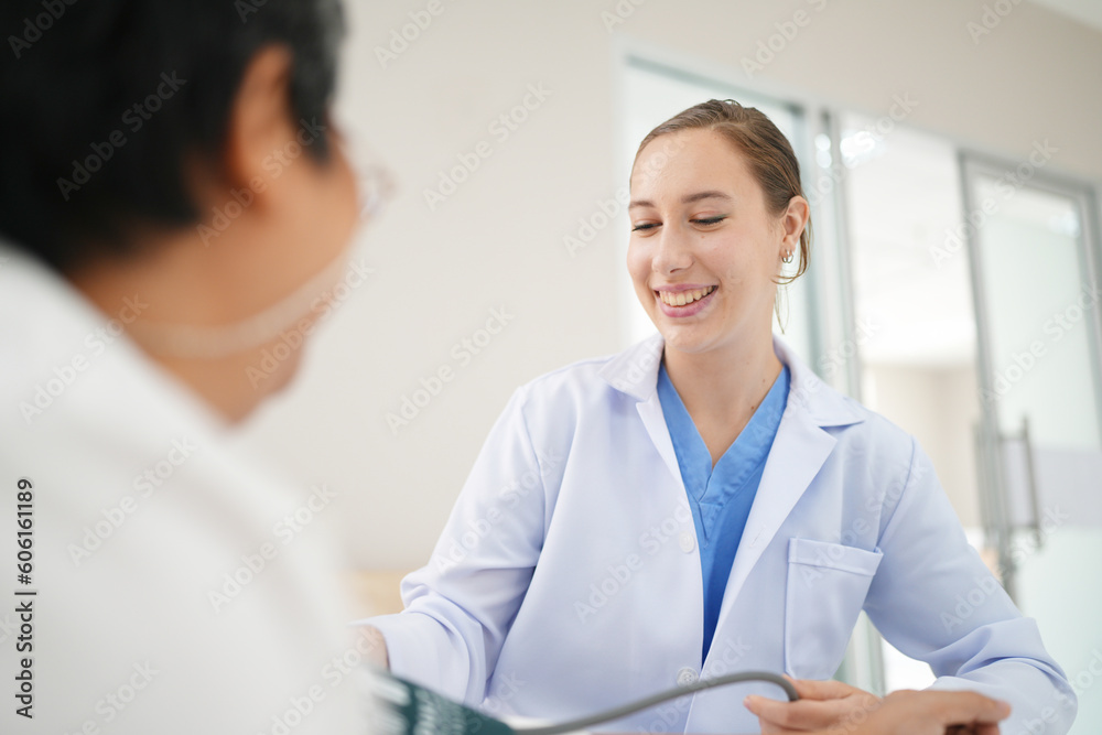 Friendly female doctor tries to support patient, holds her hands Friendly female doctor tries to support patient, holds her hands