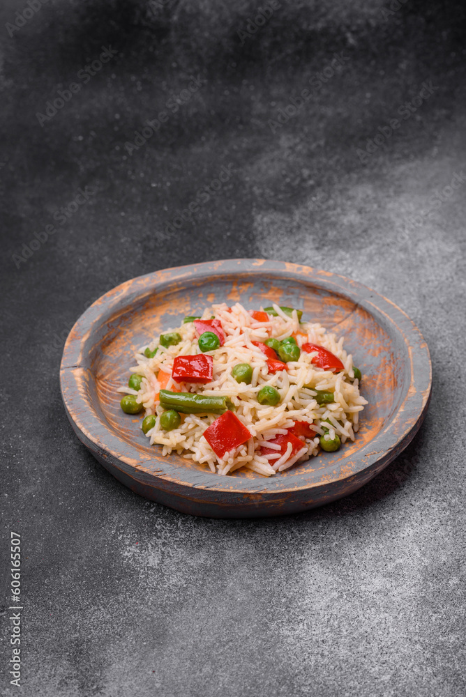 Delicious boiled rice with peppers, peas, asparagus beans and carrots Delicious boiled rice with peppers, peas, asparagus beans and carrots