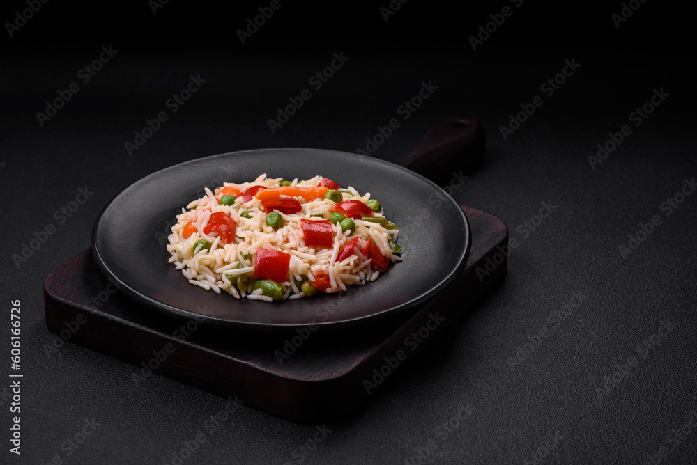Delicious boiled rice with peppers, peas, asparagus beans and carrots Delicious boiled rice with peppers, peas, asparagus beans and carrots