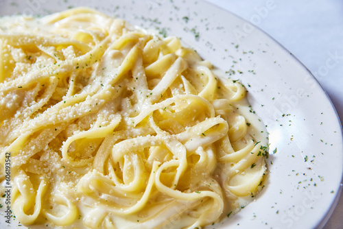 Photography Dinner lunch Italian alfredo pasta food dish parsley on white plate white backgr