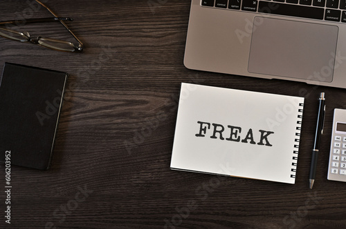 There is notebook with the word FREAK. It is as an eye-catching image.