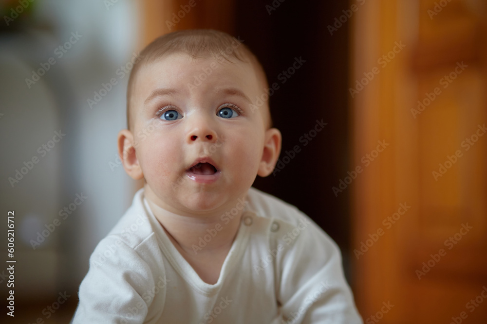 Portrait of a crawling child on the carpet in my room