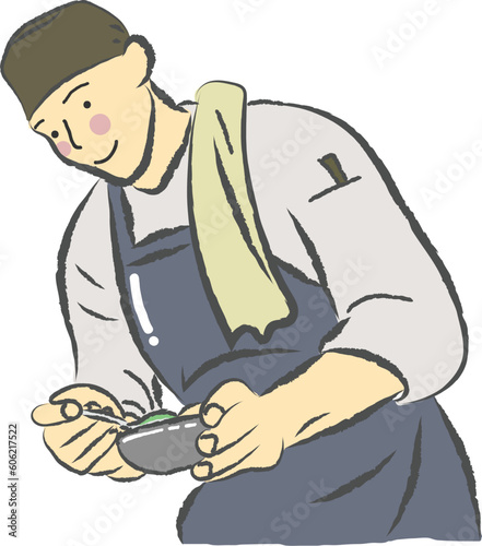 man as a chef or cook plating the sauce