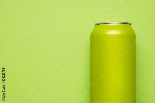 Can of soda on green backgr...