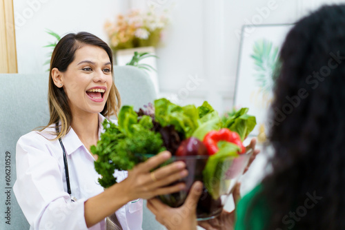 Female woman having a consulting with a professional doctor or nutritionist about eating and nutrition.