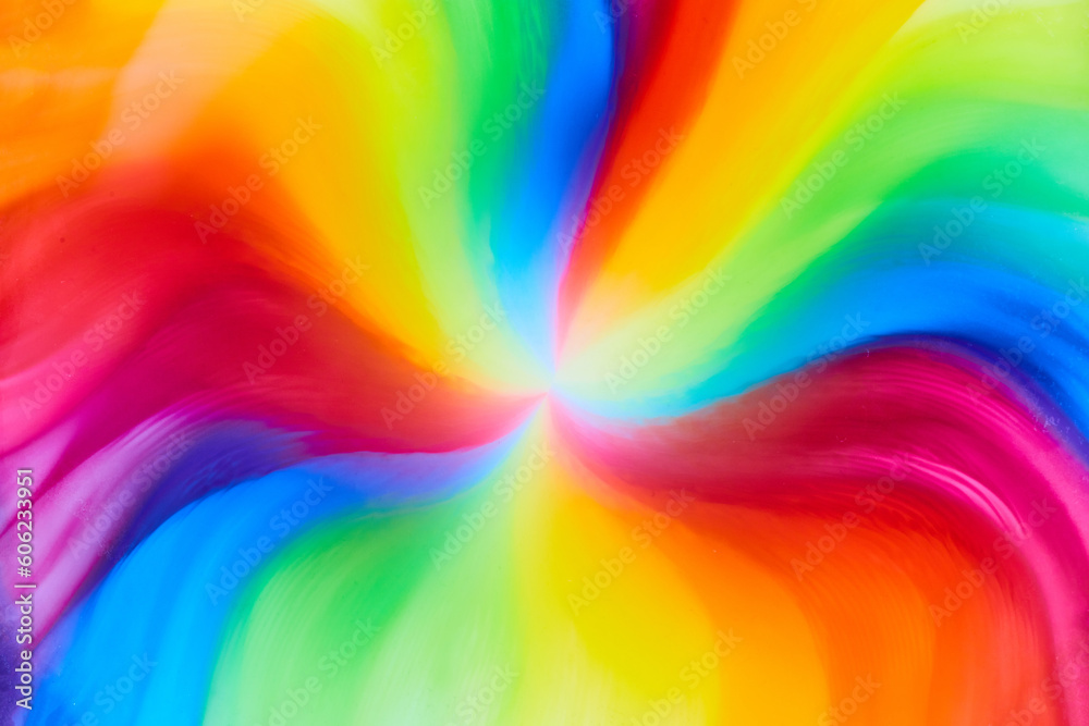 Horizontal of rainbow tie die colors from skittles water and color as candy and sugar dies create psychedelic hippie background - obrazy, fototapety, plakaty 