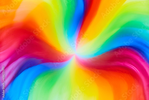 Papier peint Horizontal of rainbow tie die colors from skittles water and color as candy and