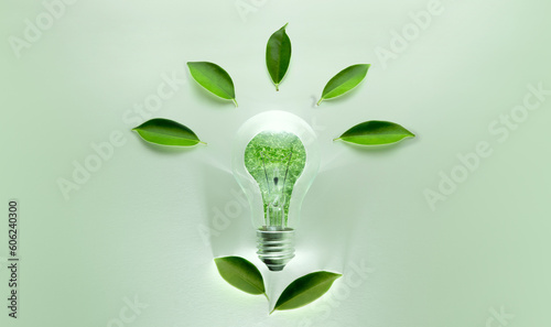 Green Energy Concepts. Wireless Light Bulb with Green Leaf form as Sign of Lights On. Carbon Neutral and Emission ,ESG for Clean Energy. Sustainable Resources, Renewable and Environmental Care