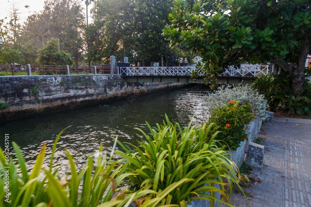 Fototapeta premium The Kapu Ela river flowing through the city of Galle in Sri Lanka 