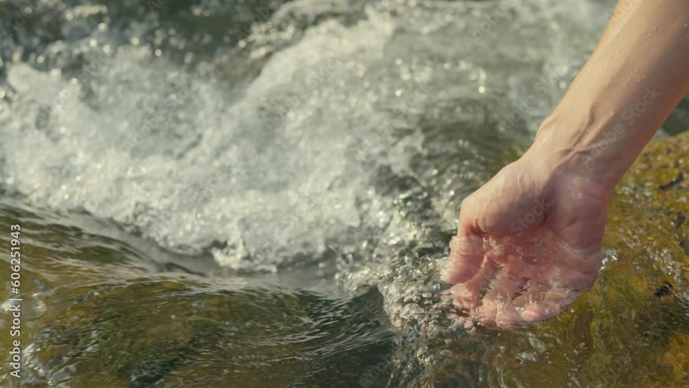 Hands touching water in wild river. People travel. Nature and life concept. Hands touching water in wild river. People travel. Nature and life concept.