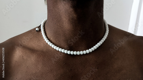 person with necklace