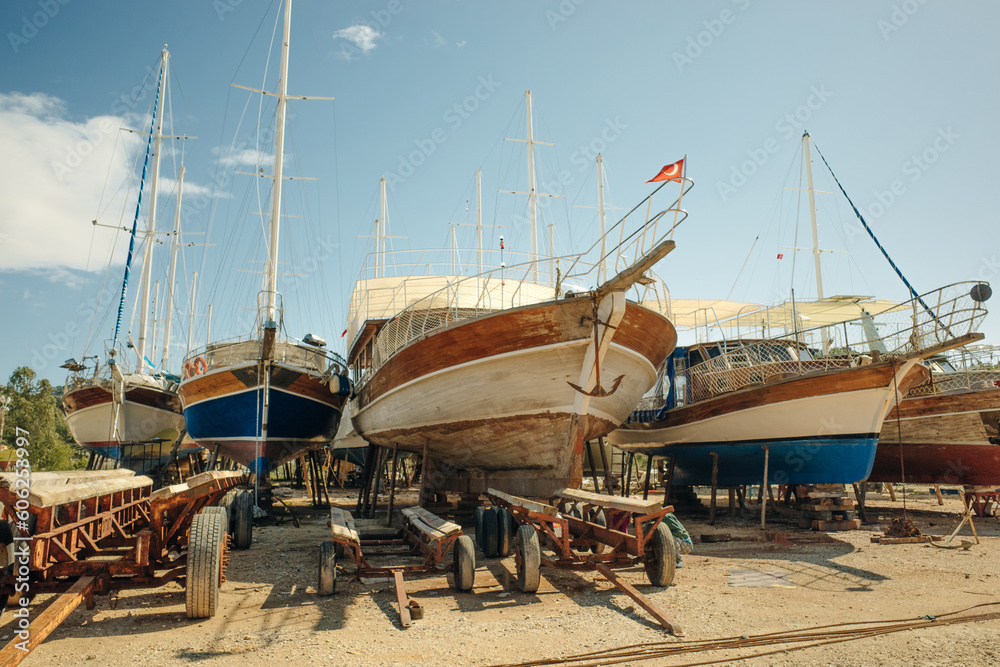 ships stand on the shore out of season for painting and repairs ships stand on the shore out of season for painting and repairs