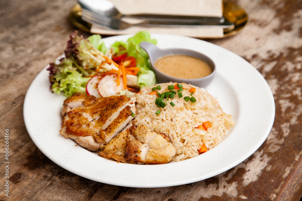 Garlic fried rice with grilled chicken and salad