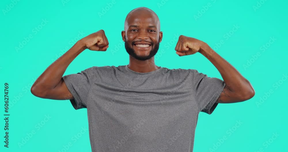 Portrait, strong and biceps with a black man in studio on a blue background for health or fitness. Muscle, arms and body with a handsome young male athlete posing indoor for exercise or training Portrait, strong and biceps with a black man in studio on a blue background for health or fitness. Muscle, arms and body with a handsome young male athlete posing indoor for exercise or training