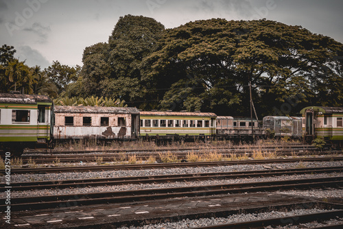 Old Train | Rusty Train | old locomotive at Thung Song Train Station in Nakhon Si Thammarat, Thailand. photo