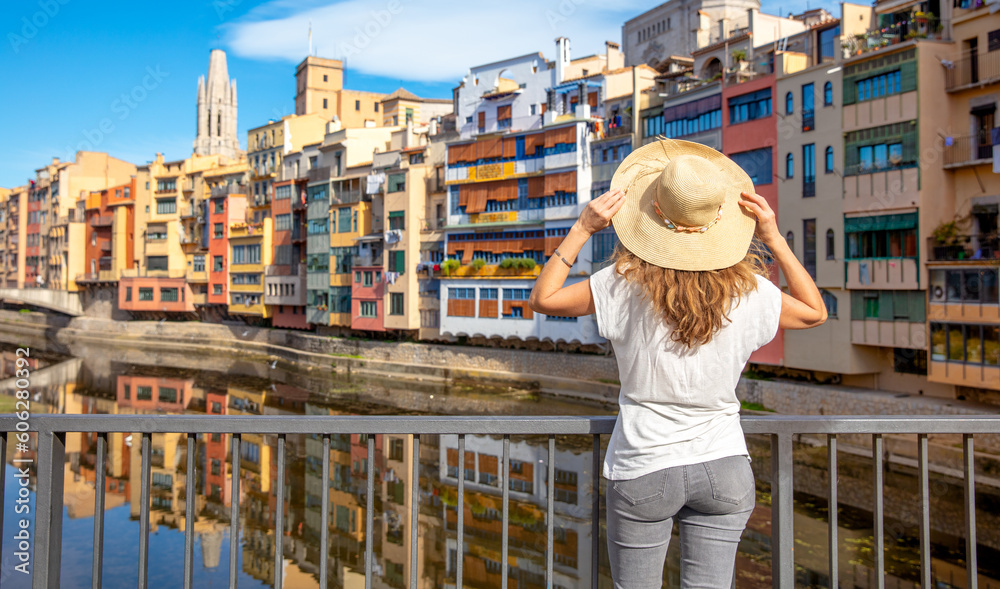 Fototapeta premium Colorful houses at river in Girona- Tour tourism in Catalonia, Spain