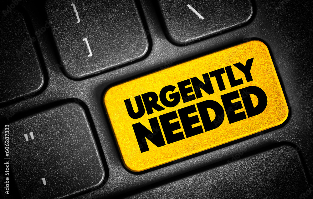 Fototapeta premium Urgently Needed text button on keyboard, concept background