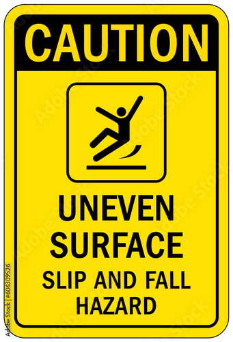 Slip and trip hazard sign and labels uneven surface photo