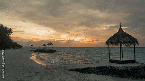 Tramonto maldiviano con mare calmo photo