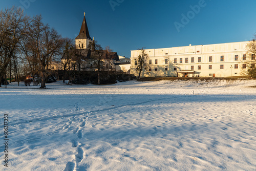 Chateau Frystat and Kostel Povyseni sv. Krize church in winter Karvina city in Czech republic photo