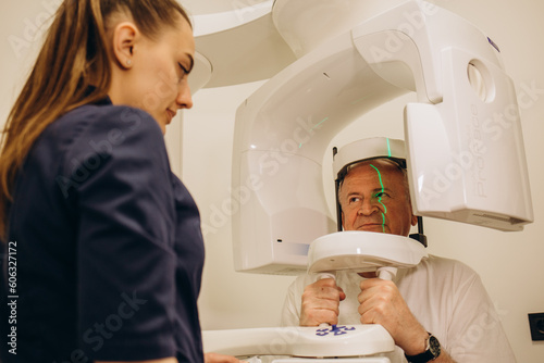 Patient in a hospital MRI scanner. Woman lays in Magnetic resonance image device. Woman patient is doing tomographic scanning in clinic.