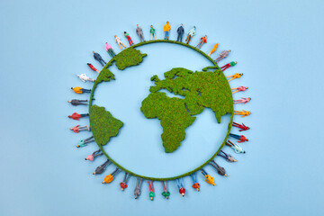 World Population Day, creative concept. Large and diverse group of people in the shape of the world map