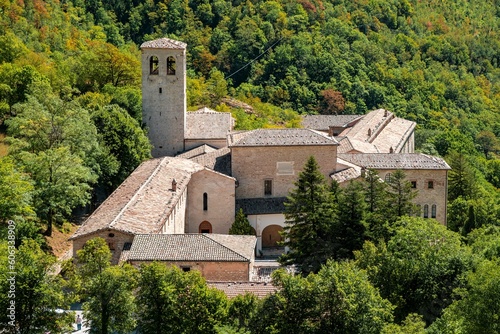 View of the Fonte Avellana Monastery in the Apennines mountains of the Marche region of Italy photo