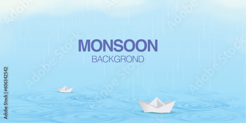 Rain drops falling on water creating ripples with paper boats sailing on water.