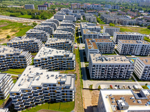 Aerial view landscape. A drone view of a modern housing development, apartment blocks. Apartments and houses. © karolinaklink