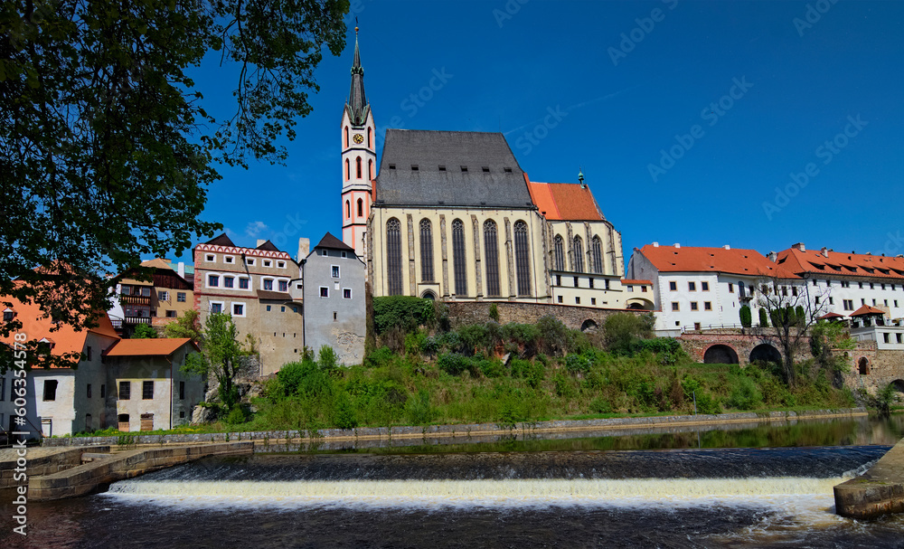 Wide angle view of old town of Cesky Krumlov (Krumau). Ancient Saint Vitus Cathedral is one of the city's best known landmarks. Famous touristic place and travel destination in Czech Republic