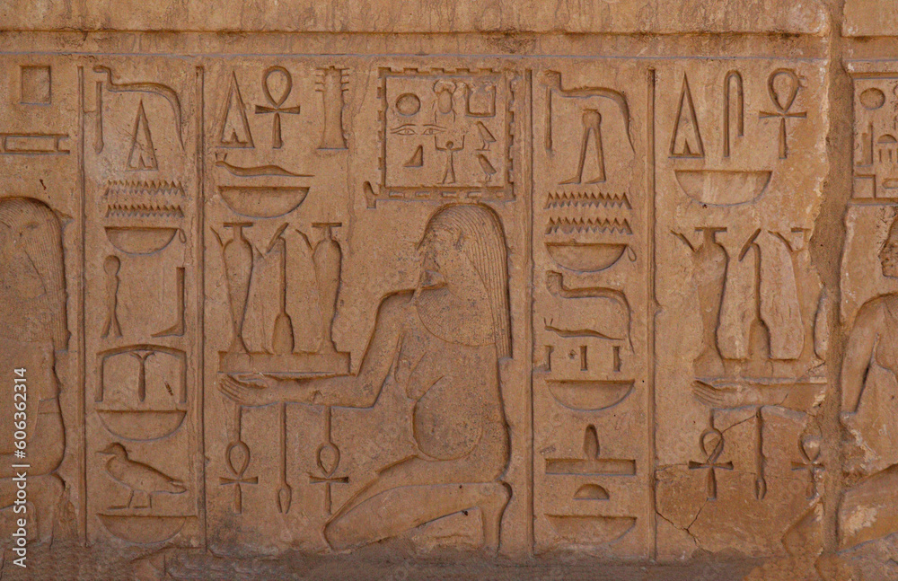 Ancient egyptian hieroglyphs carved on stone at Karnak temple, Luxor, Egypt 