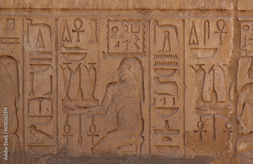 Ancient egyptian hieroglyphs carved on stone at Karnak temple, Luxor, Egypt 