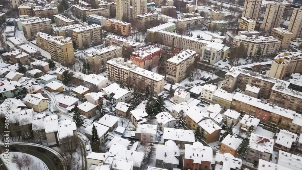 Aerial cinematic drone looking down cars driving winter Olympic ...