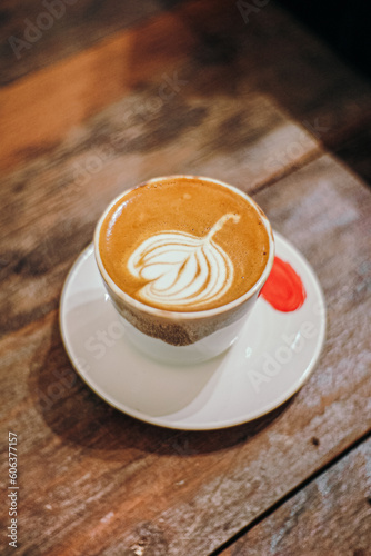 A cup of piccolo latte coffee.