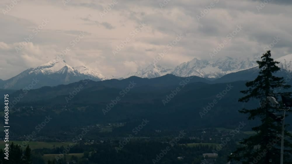 Winter snowy mountain peaks. Snow-covered mountains in Zakopane, Poland. Majestic Mountain Peaks Golden Hour Winter Wonderland. Idyllic arctic landscape. Adventure, travel background concept. Winter snowy mountain peaks. Snow-covered mountains in Zakopane, Poland. Majestic Mountain Peaks Golden Hour Winter Wonderland. Idyllic arctic landscape. Adventure, travel background concept.
