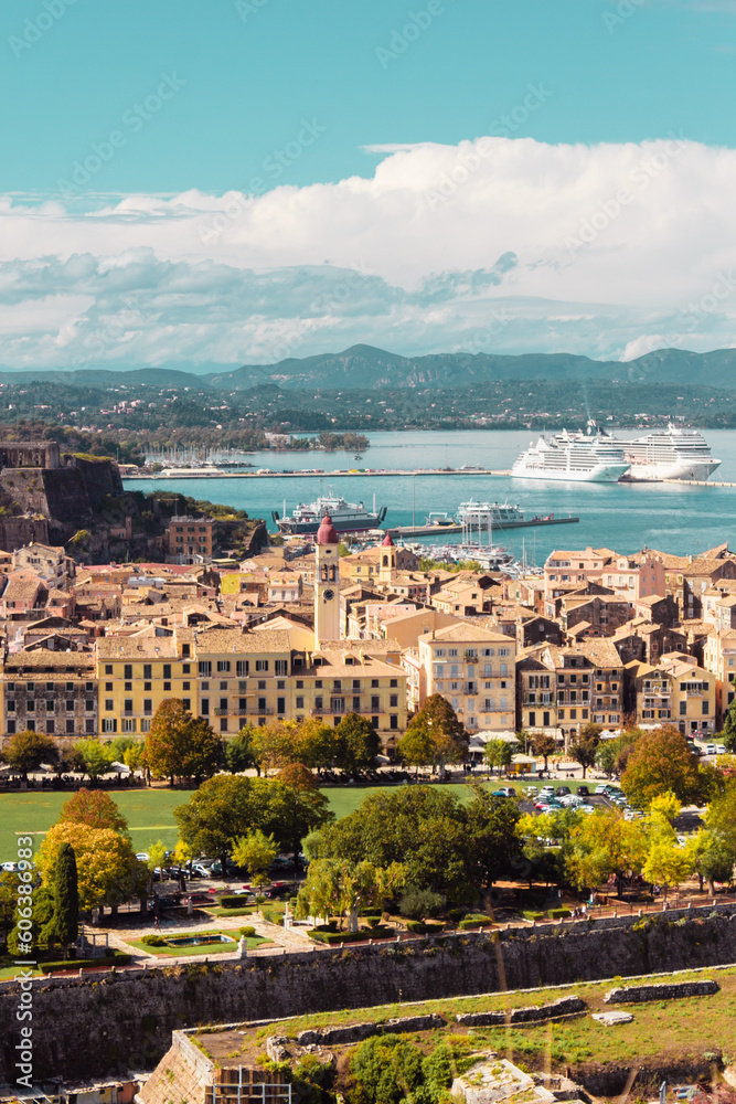 Panoramic view of the city on the island of Corfu in Greece. Port with ships, the sea and the streets of the old city in the light of the sun