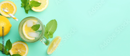 Lemonade with mint panorama, Lemon water drink with ice, Two glasses and lemons on a pastel background overhead flat lay shot, Detox beverage, Fresh homemade cocktail
