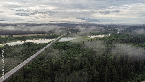 Aerial shot of a river under a cloudy sky in Invermere, BC, Canada.