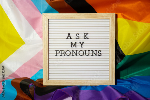 Tableau sur toile ASK MY PRONOUNS text Neo pronouns concept on Rainbow flag background gender pronouns
