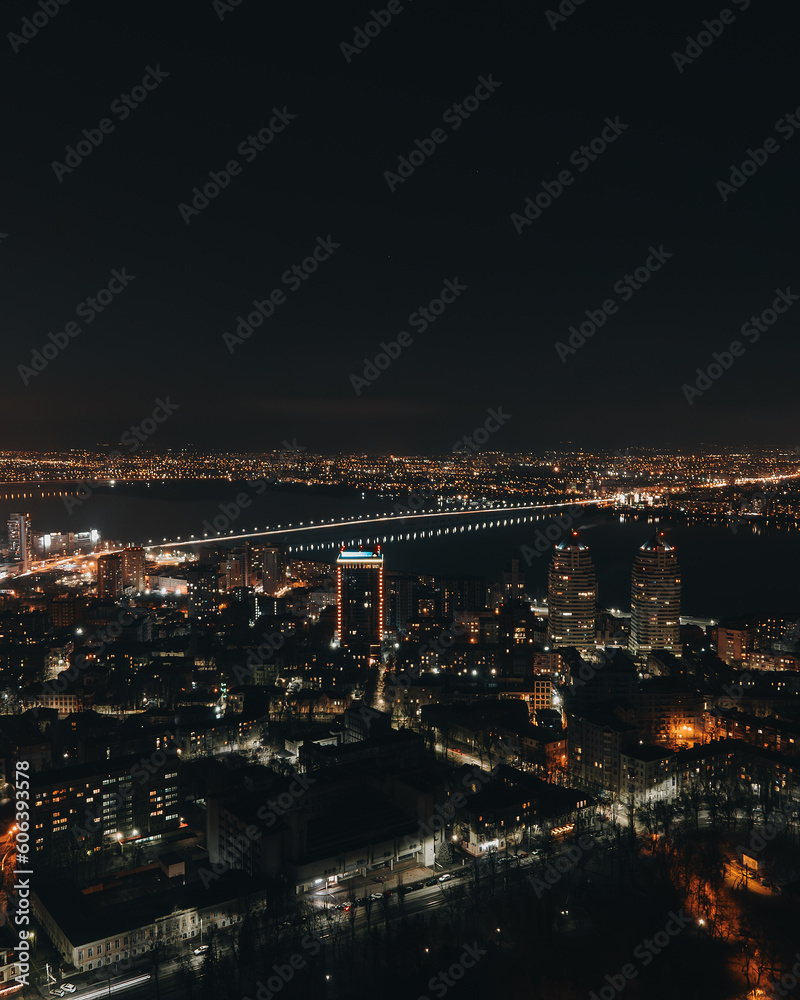 Night aerial view of the city of Dnipro, Ukraine. Left side of the city. Central part of the city.