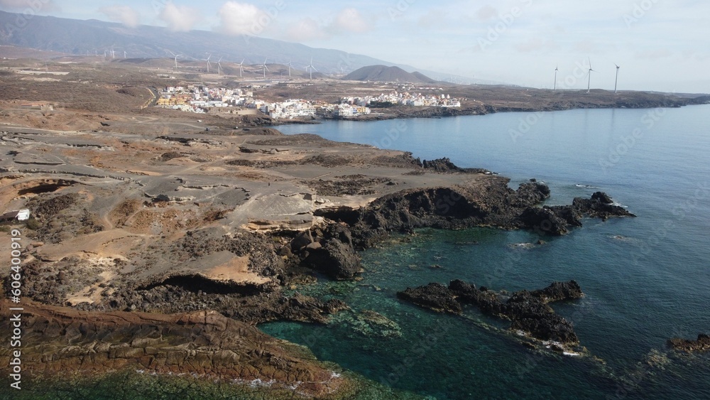 Aerial view of coastal Tenerife, Canary Islands with sea and town of La Jaca in the background