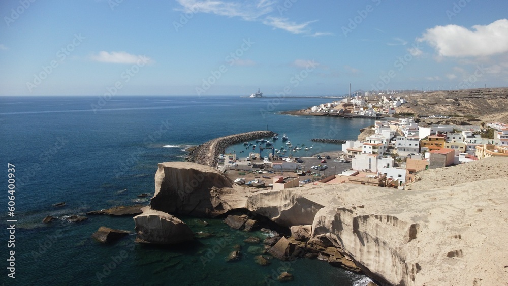 Drone shot of San Miguel de Tajao town with fishing port in Tenerife, Canary Islands