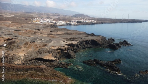 Aerial view of coastal Tenerife, Canary Islands with sea and town of La Jaca in the background