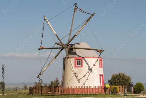 Old windmill of wind energy in the Urban Park of Santa Iria de Azoia in Loures, Portugal photo
