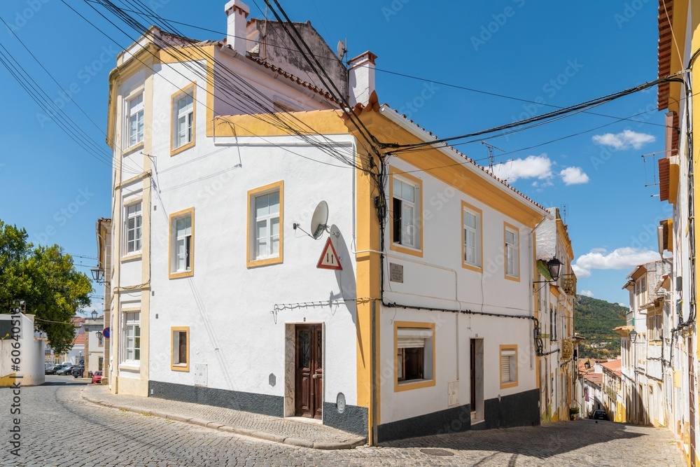 Beautiful building painted in white and yellow in the historic area of the city of Portalegre Beautiful building painted in white and yellow in the historic area of the city of Portalegre