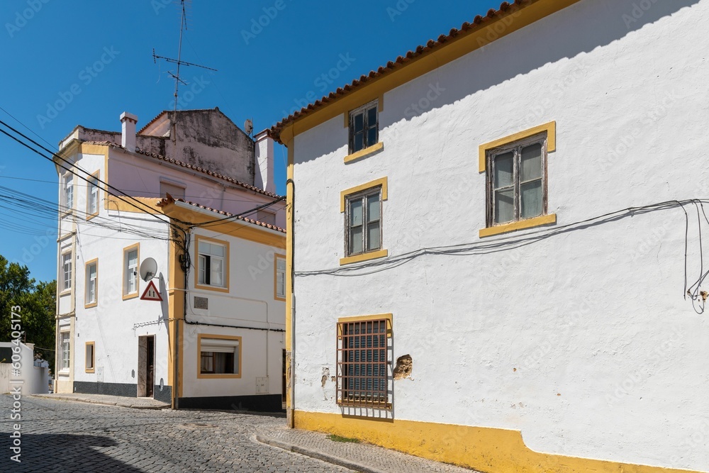Beautiful building painted in white and yellow in the historic area of the city of Portalegre