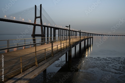 Mesmerizing sunrise view over the Vasco of Gama Bridge on the Tagus River in Lisbon  Portugal